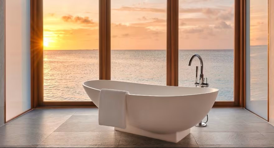 Sunset Over Water Villa Photo 2