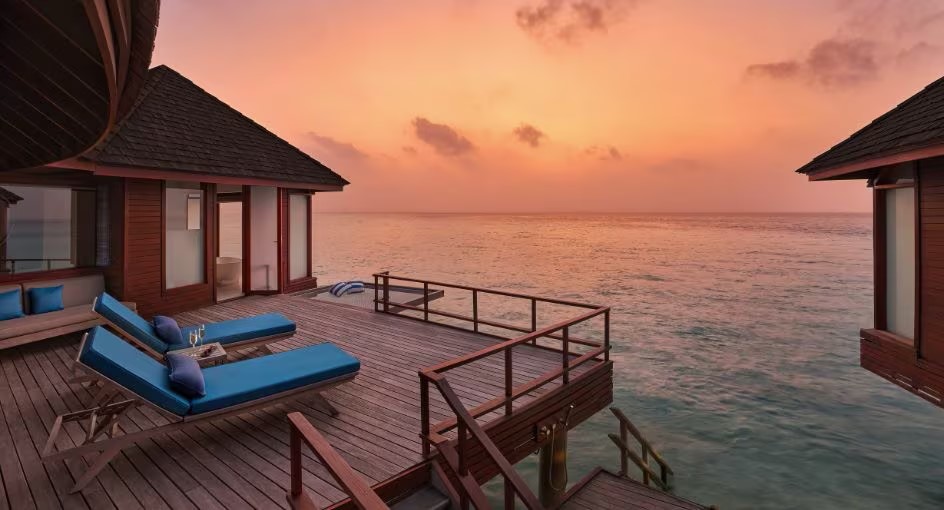 Sunset Over Water Villa Photo 1